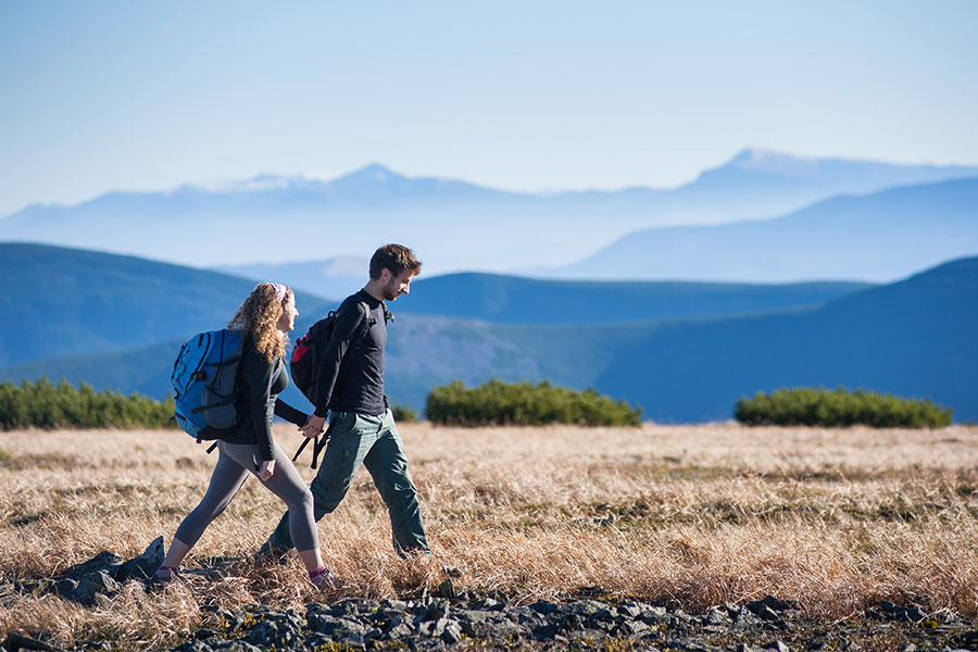 couple hiking in mountains